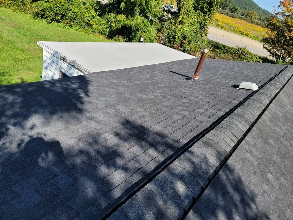 Slide of Hawk Roofing