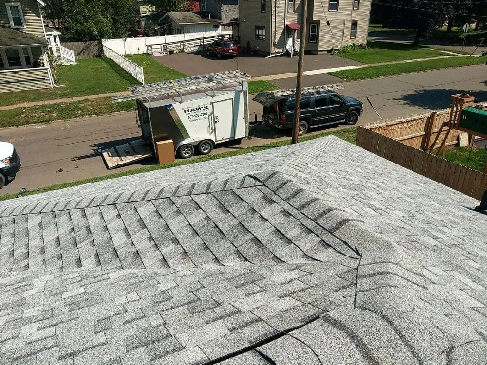 Slide of Hawk Roofing