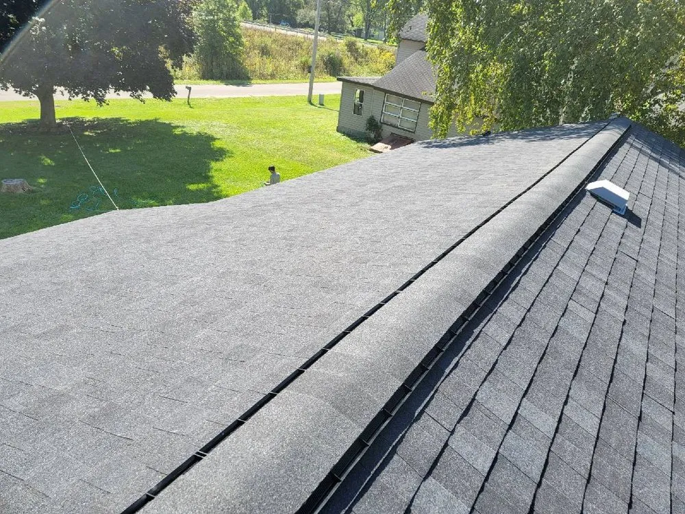 Slide of Hawk Roofing