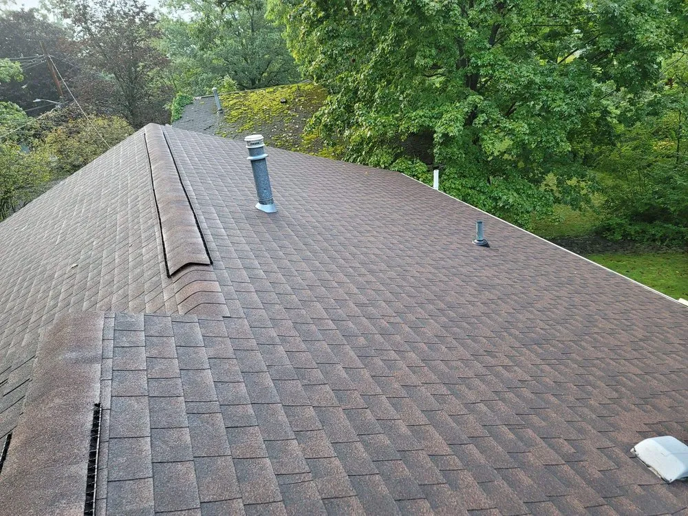 Slide of Hawk Roofing