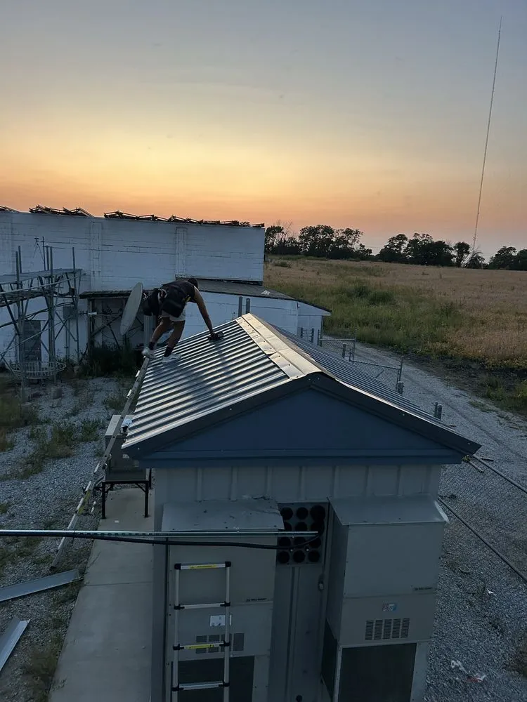 Slide of Hawkeye Roofing & Construction