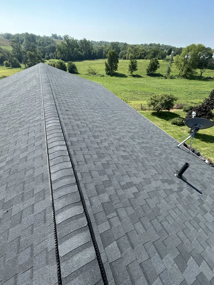 Slide of Hawkeye Roofing & Construction