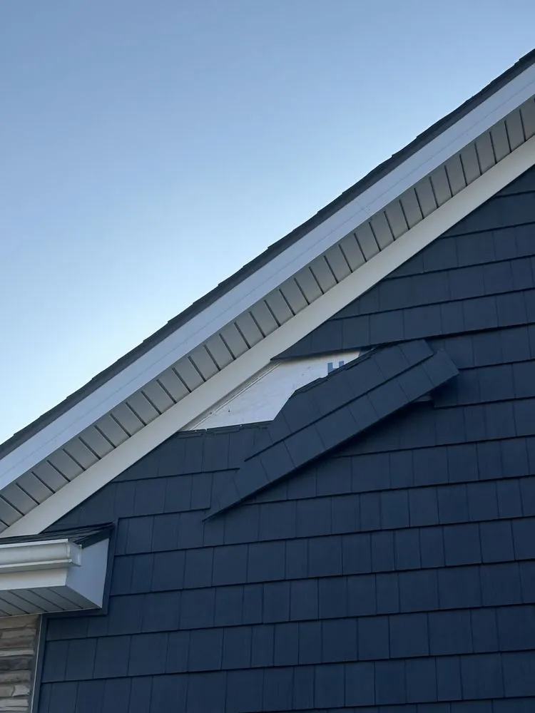 Slide of Hawkeye Roofing & Construction