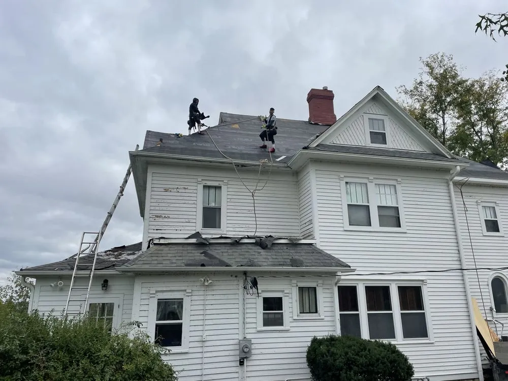 Slide of Hawkeye Roofing