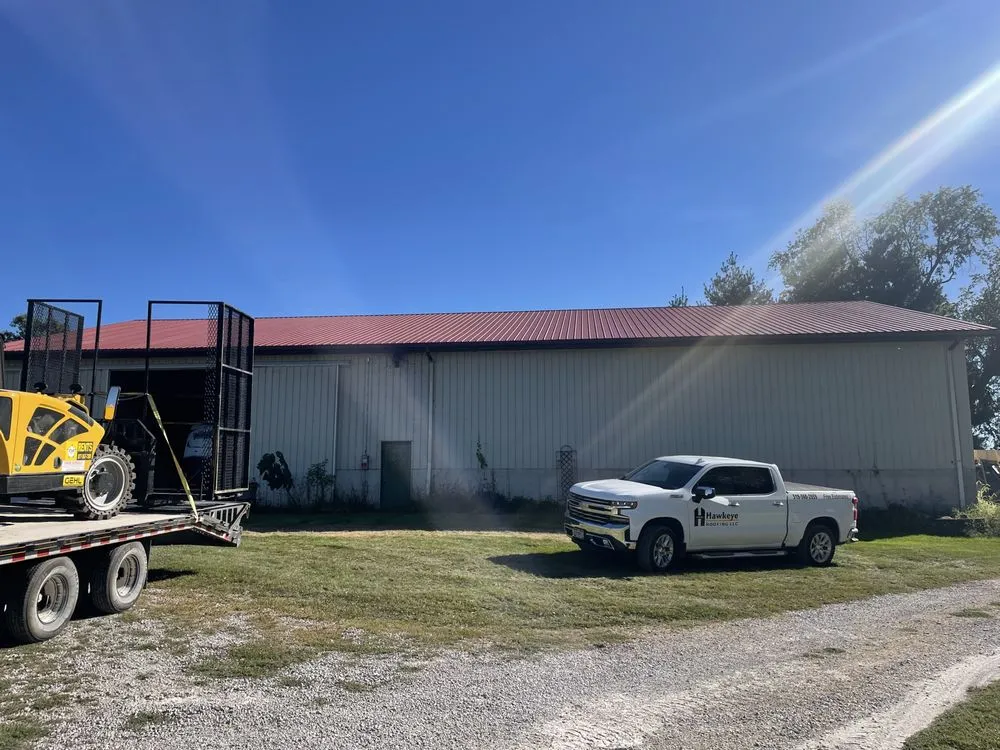 Slide of Hawkeye Roofing