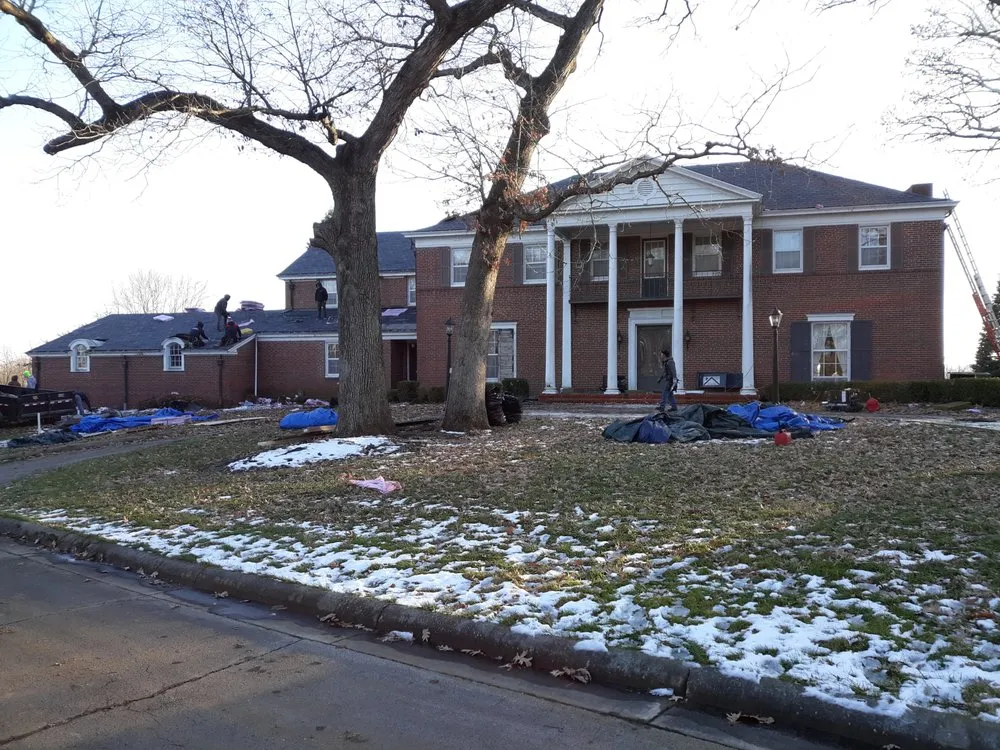 Slide of Hawkeye Roofing