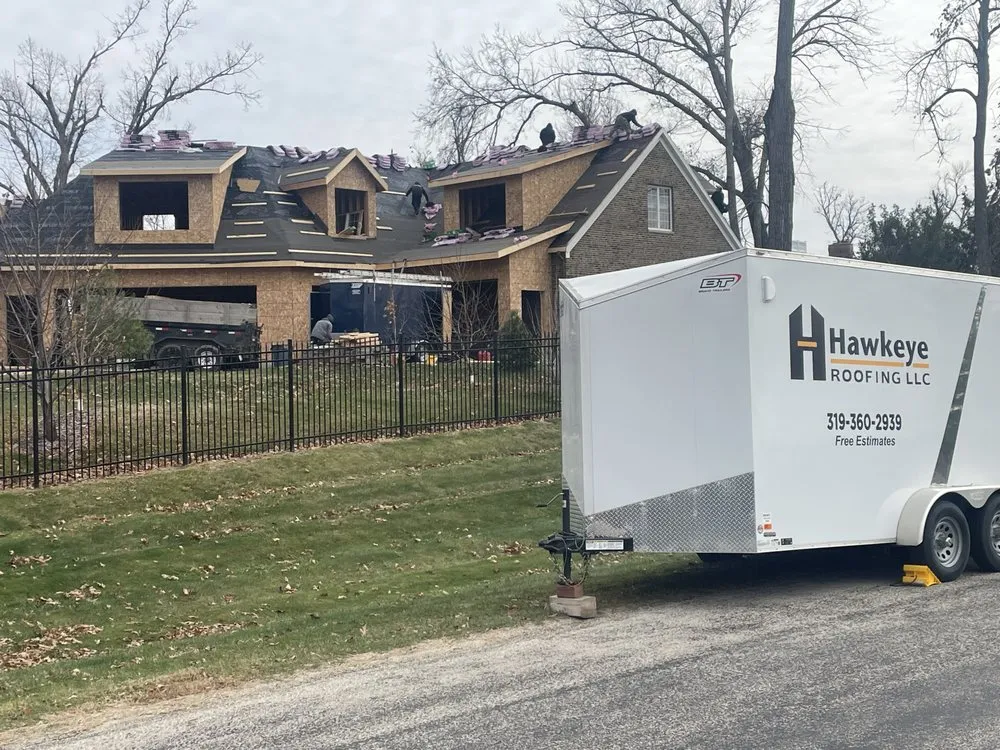 Slide of Hawkeye Roofing