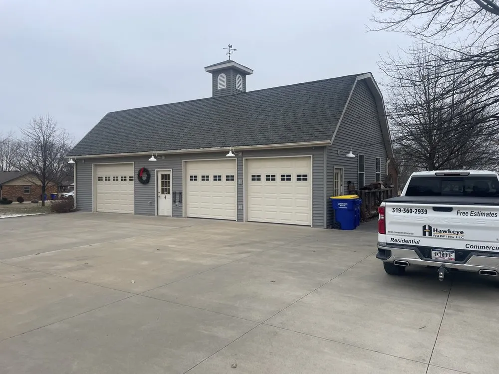 Slide of Hawkeye Roofing