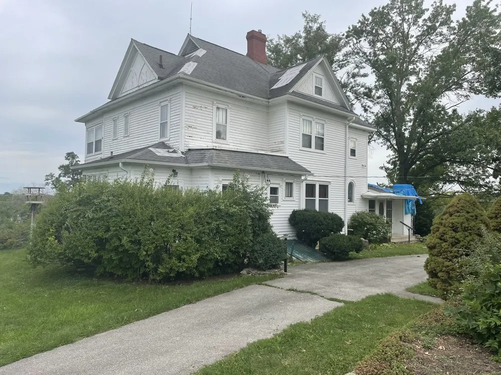 Slide of Hawkeye Roofing