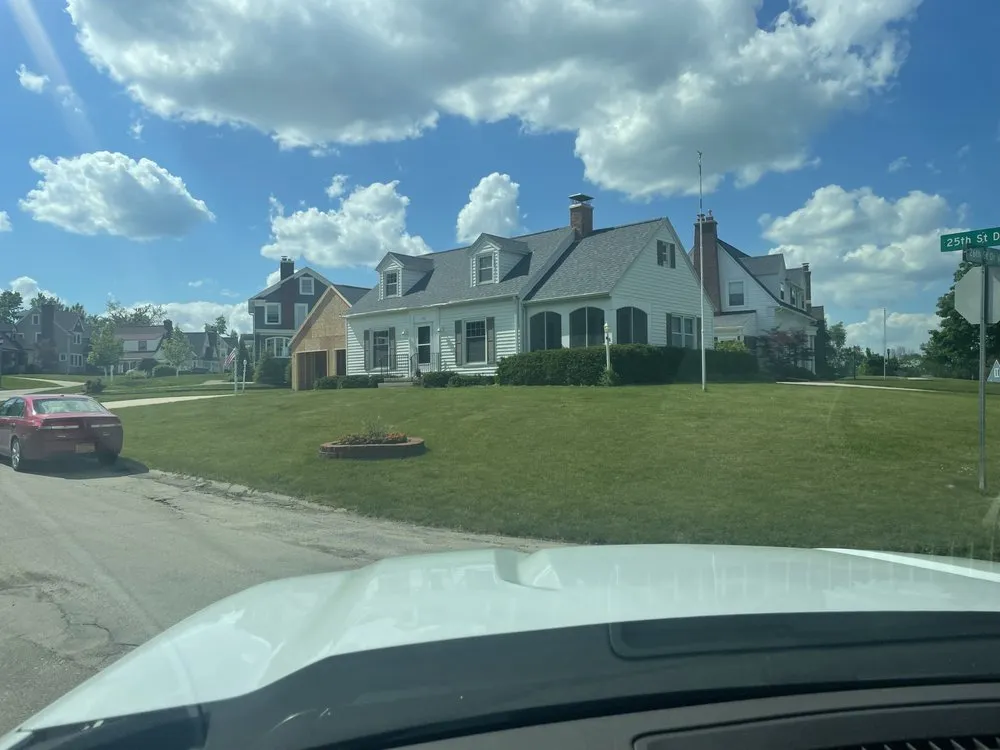 Slide of Hawkeye Roofing