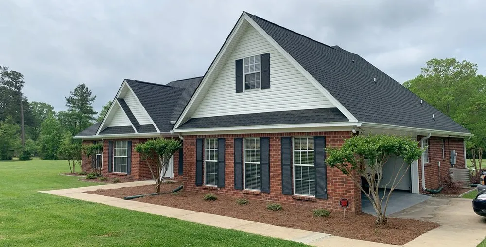 Slide of Hayman's Roofing