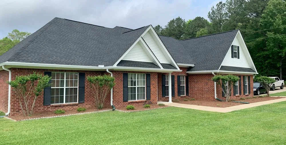 Slide of Hayman's Roofing