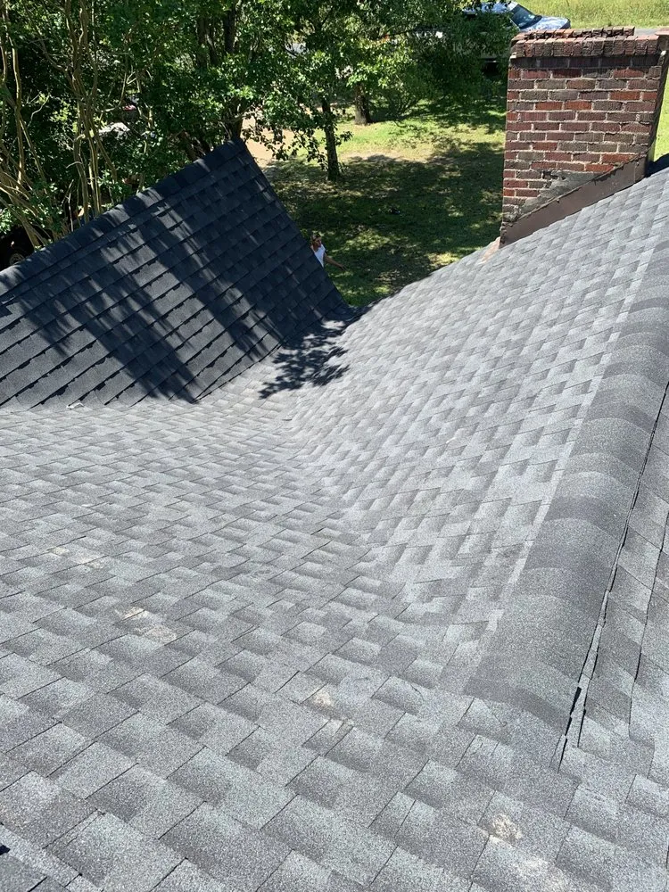 Slide of Hayman's Roofing