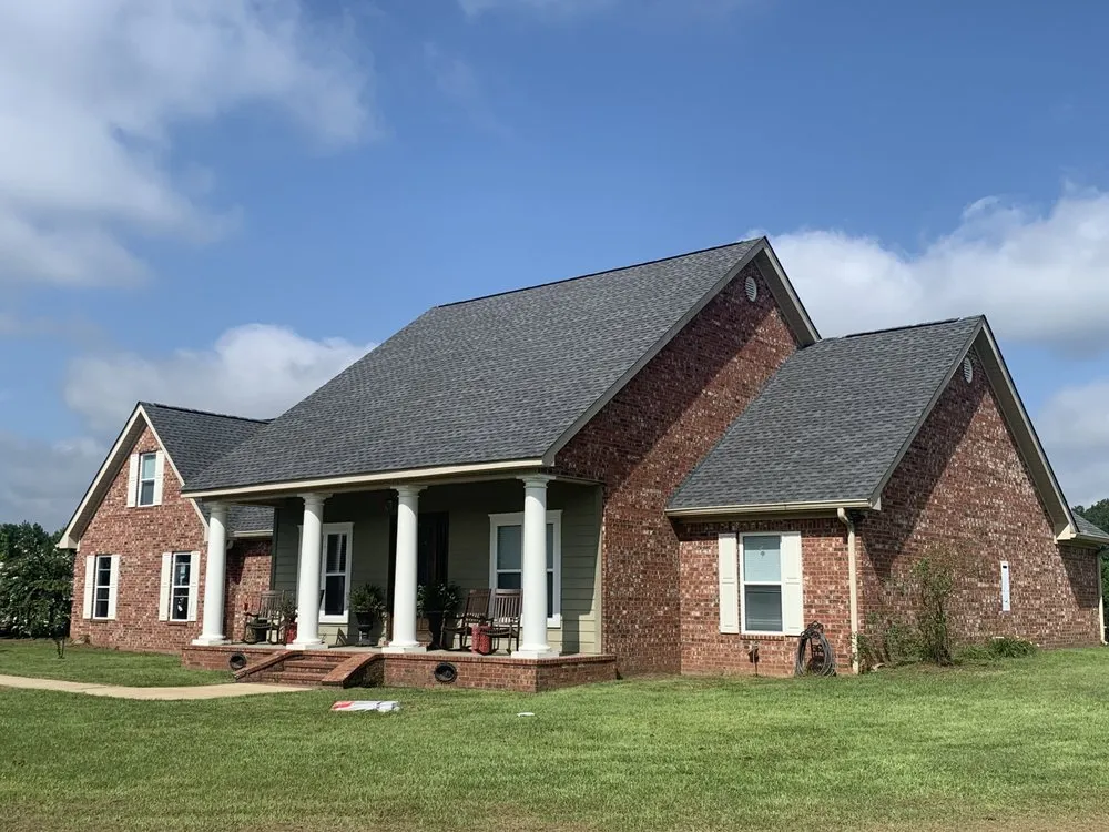 Slide of Hayman's Roofing