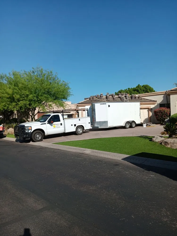 Slide of Hays Roofing