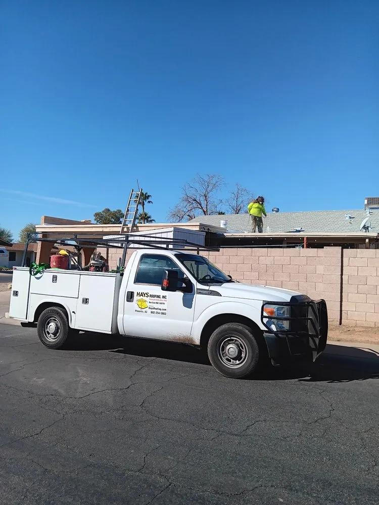Slide of Hays Roofing
