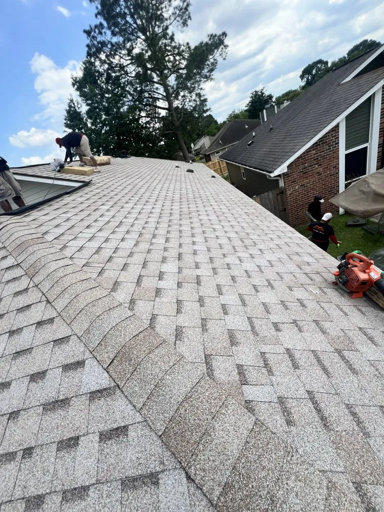 Slide of Haywood Roofing
