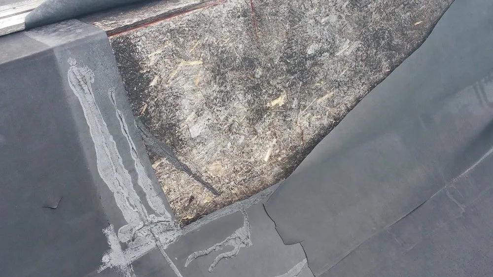 Slide of HC Anderson Roofing Company