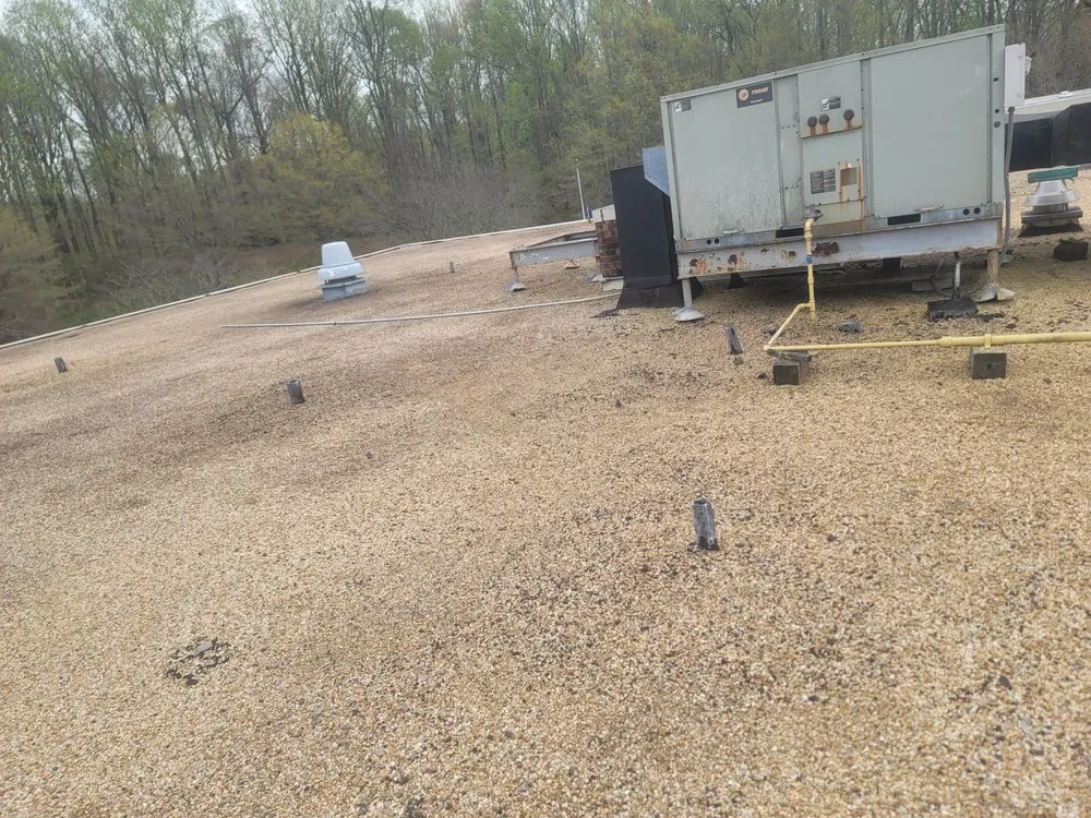 Slide of HD Commercial Roofing