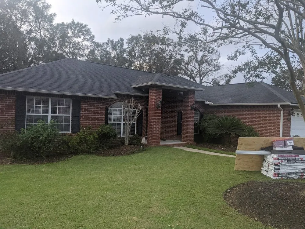 Slide of H.E. Roberts Roofing