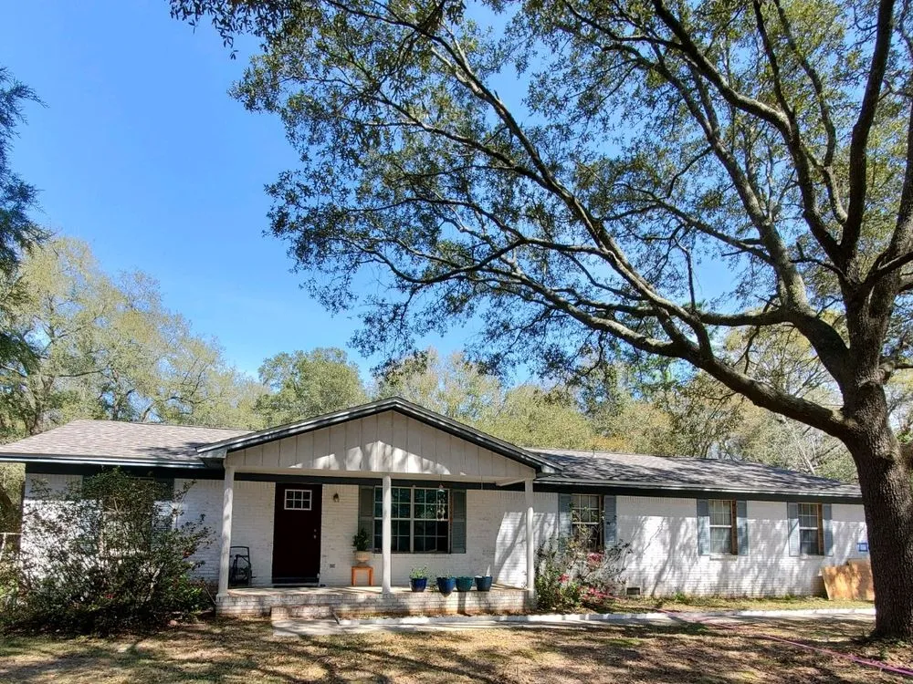Slide of H.E. Roberts Roofing