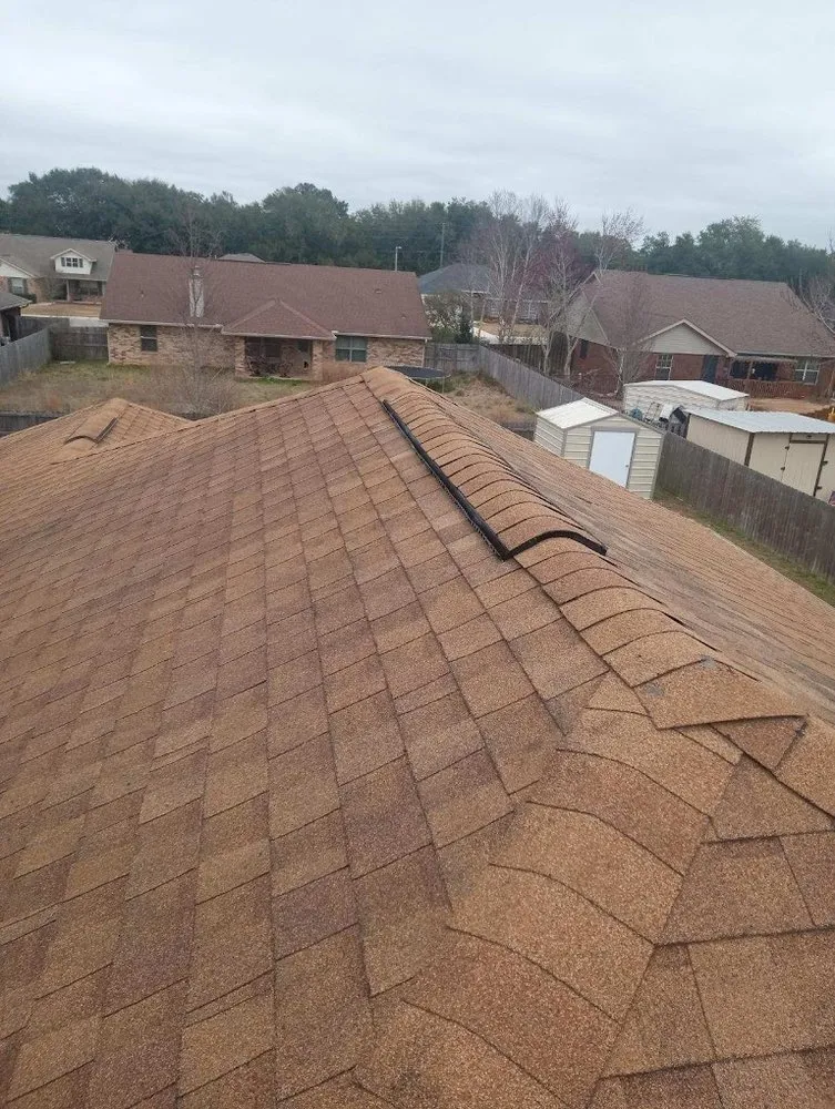 Slide of H.E. Roberts Roofing