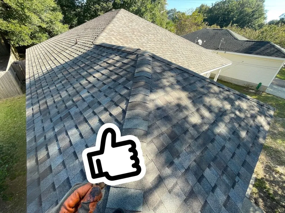 Slide of H.E. Roberts Roofing