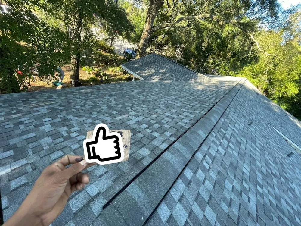 Slide of H.E. Roberts Roofing