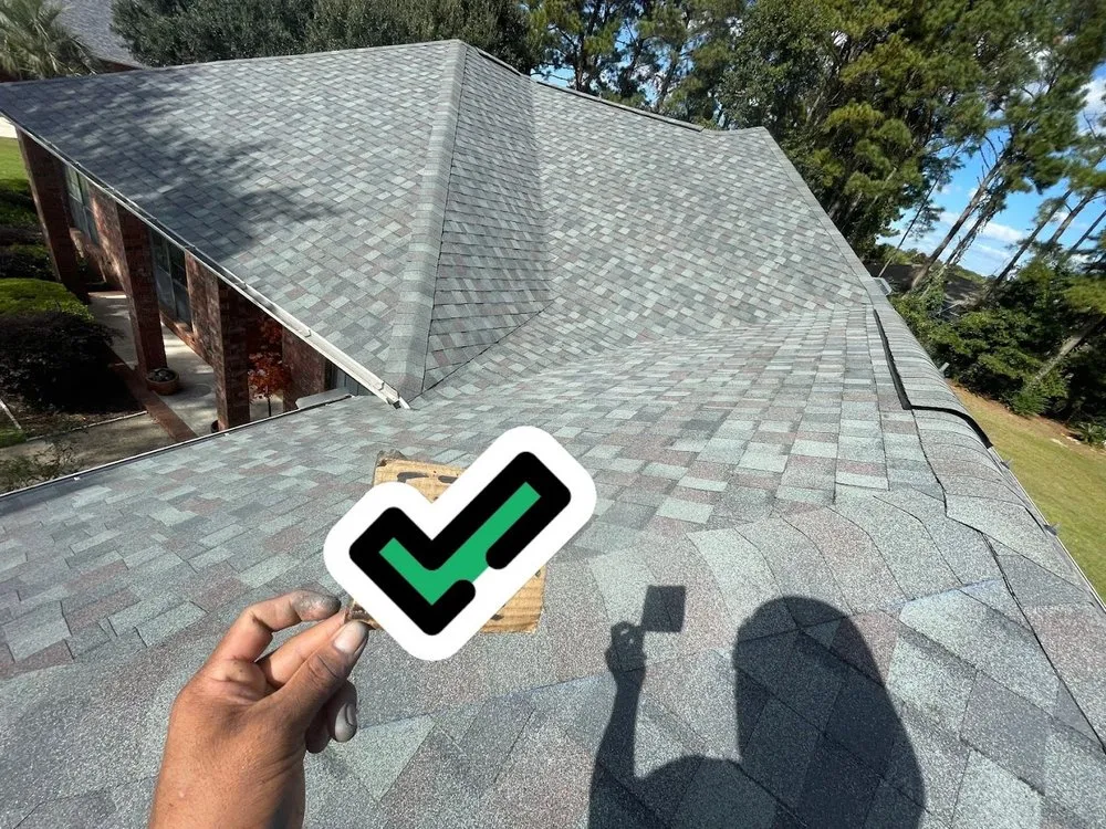 Slide of H.E. Roberts Roofing