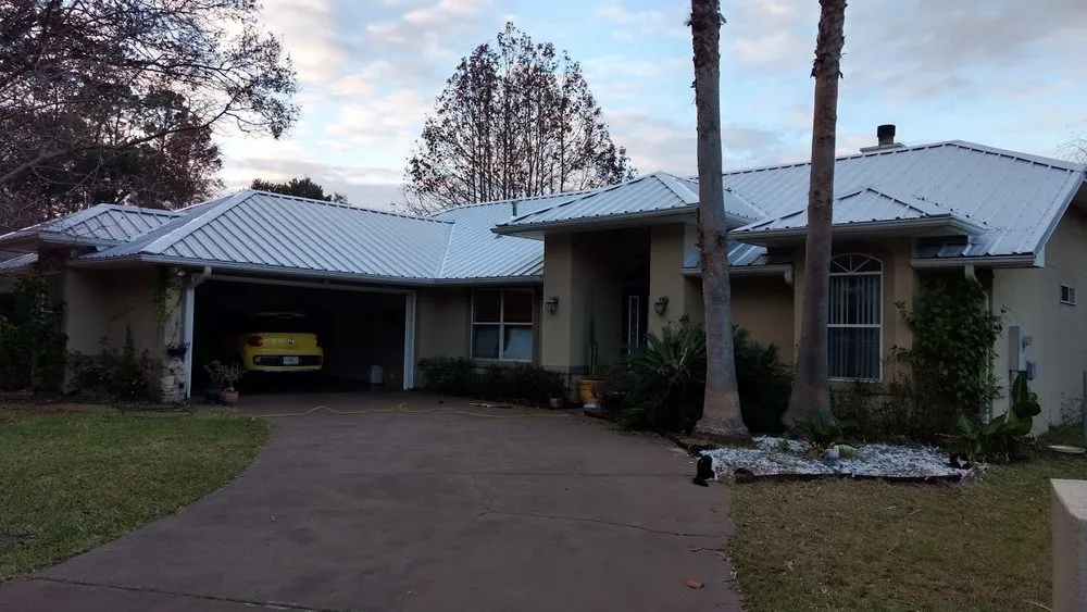 Slide of H.E. Roberts Roofing
