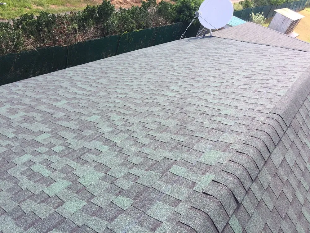 Slide of Headed Home Roofing and Painting