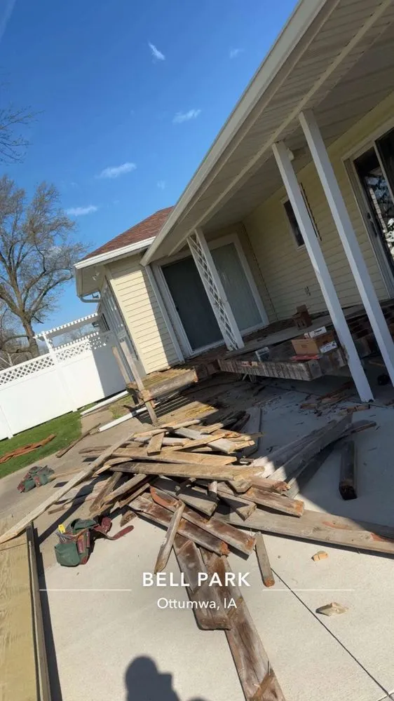Emergency storm damage roof repair in Drakesville, IA by Heartland Commercial Roofing