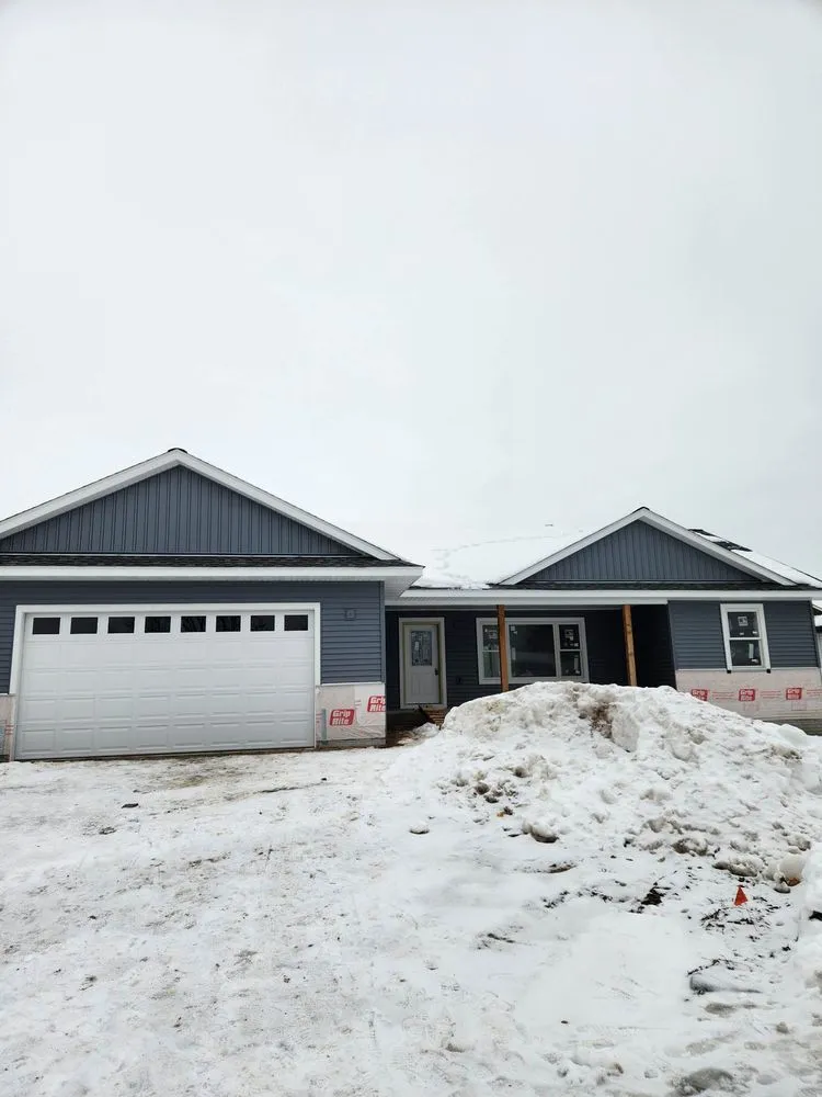 Slide of Heartland Exteriors & Garage Doors