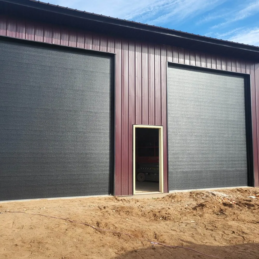 Slide of Heartland Exteriors & Garage Doors