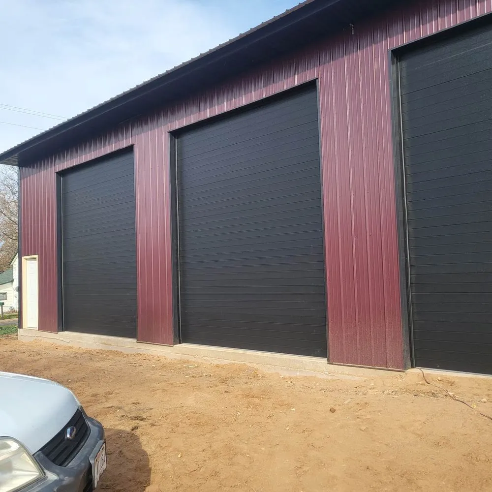 Slide of Heartland Exteriors & Garage Doors