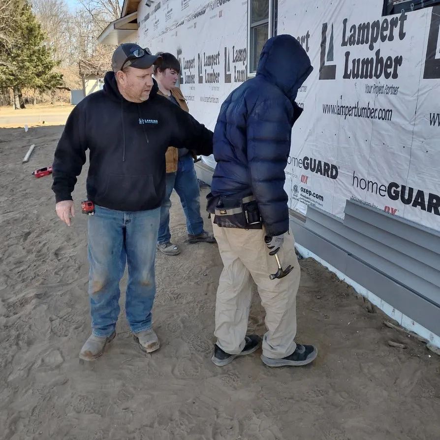Slide of Heartland Exteriors & Garage Doors