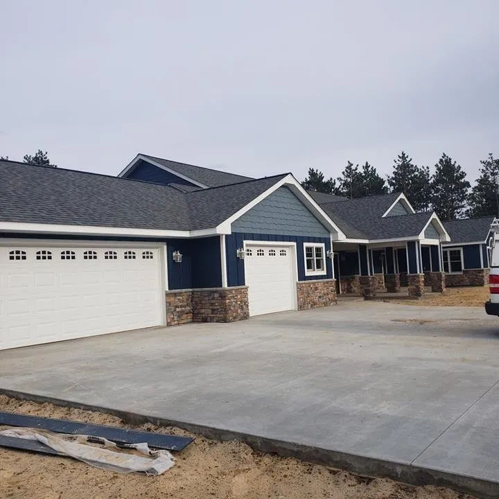 Slide of Heartland Exteriors & Garage Doors