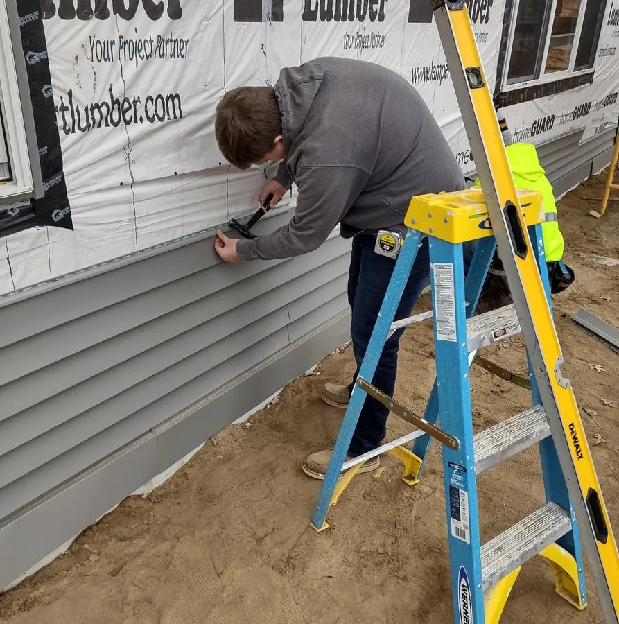 Slide of Heartland Exteriors & Garage Doors