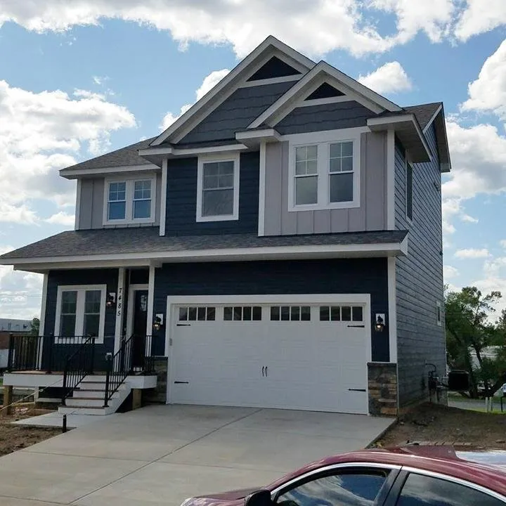 Slide of Heartland Exteriors & Garage Doors