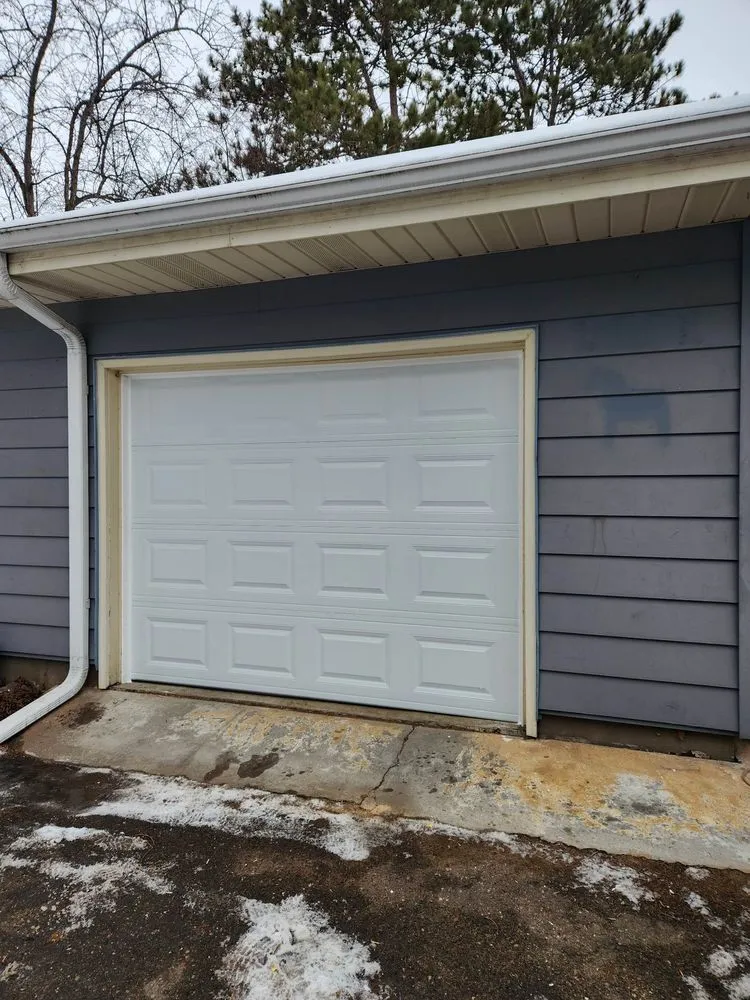 Slide of Heartland Exteriors & Garage Doors