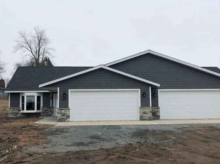 Slide of Heartland Exteriors & Garage Doors