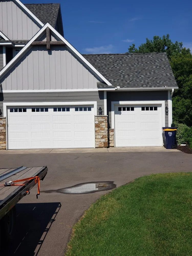 Slide of Heartland Exteriors & Garage Doors