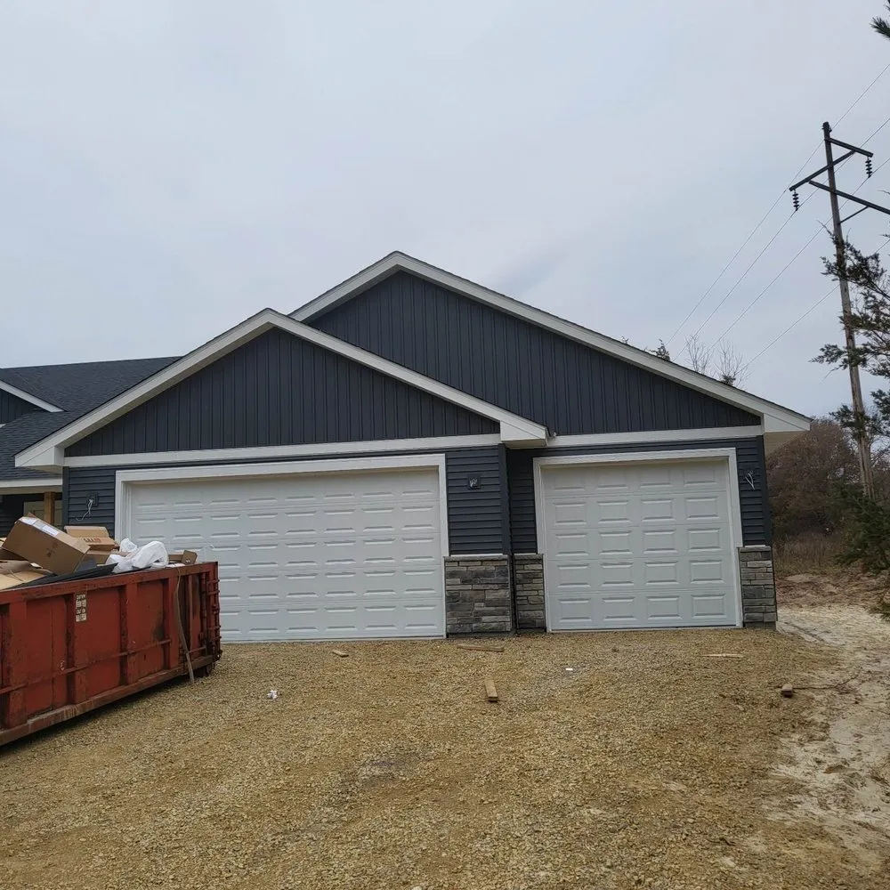 Slide of Heartland Exteriors & Garage Doors