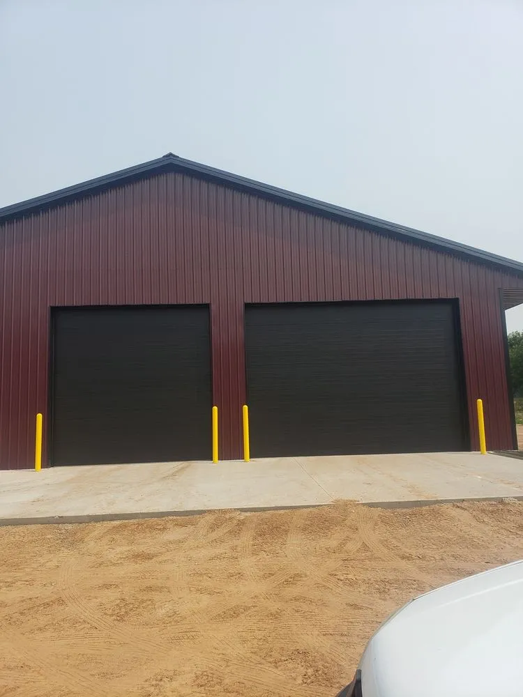 Slide of Heartland Exteriors & Garage Doors