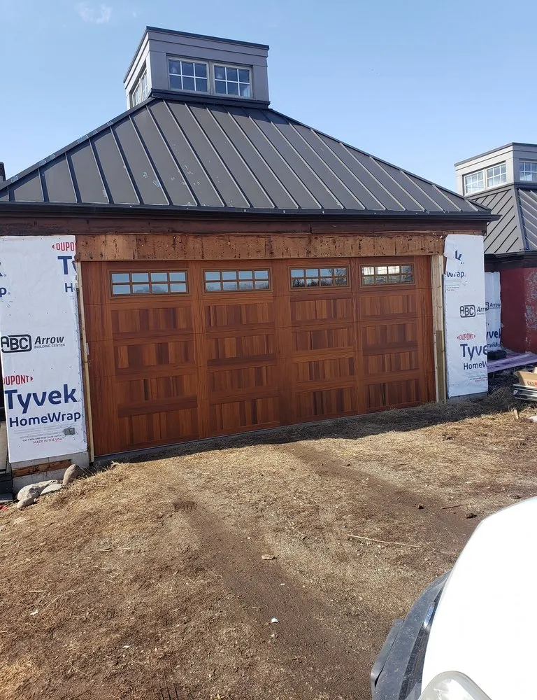 Slide of Heartland Exteriors & Garage Doors