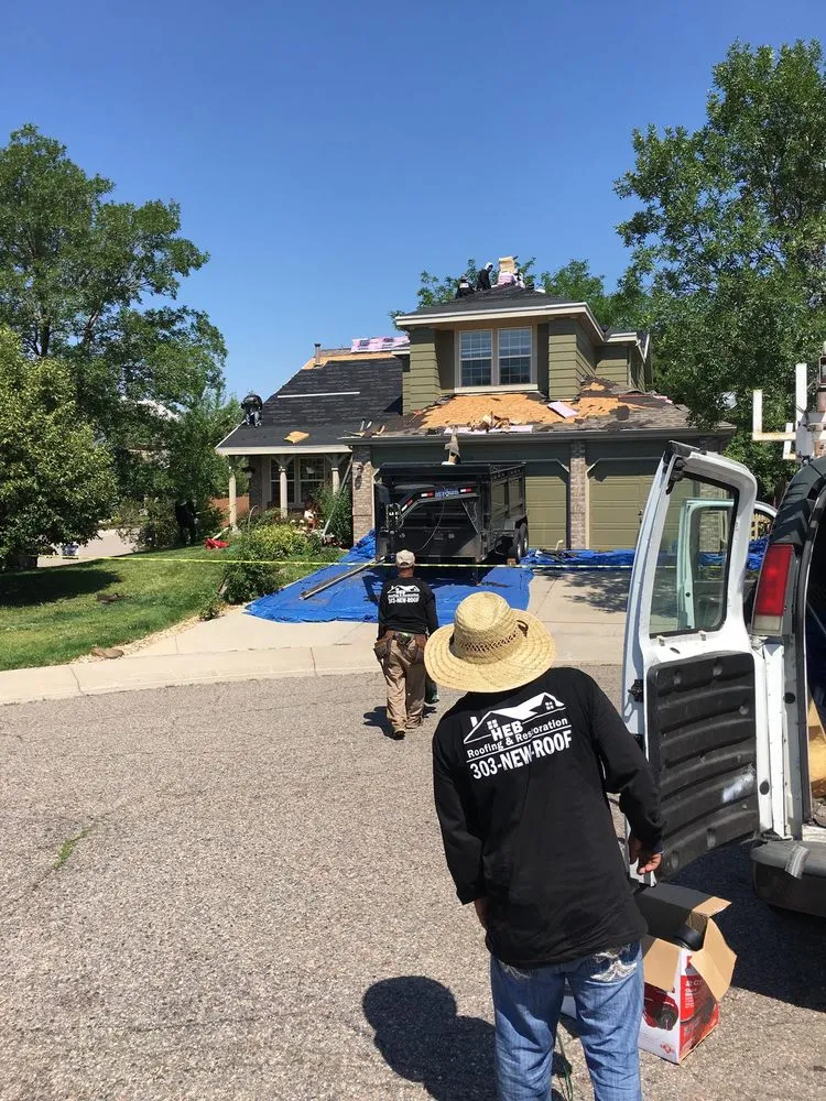 Slide of HEB Roofing & Restoration