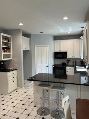 Hector's Carpentry & Roofing Logo