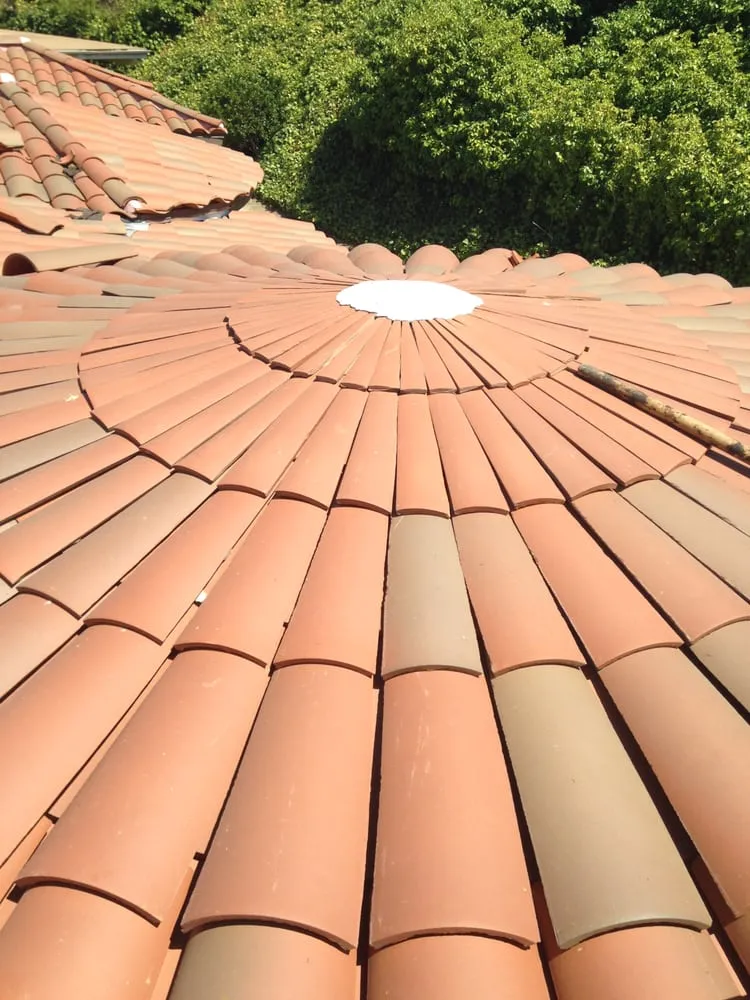 Slide of Hector's Roofing