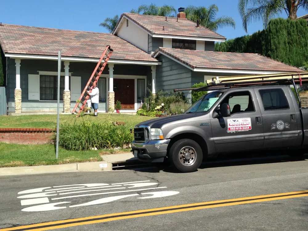 Slide of Hector's Roofing