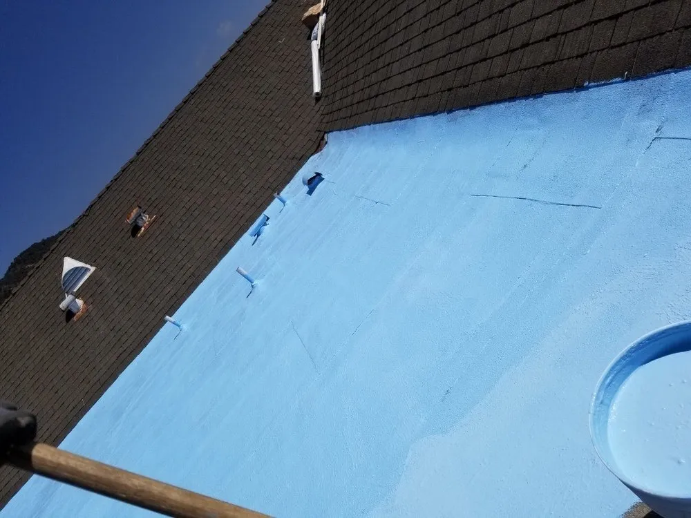 Slide of Hector's Roofing